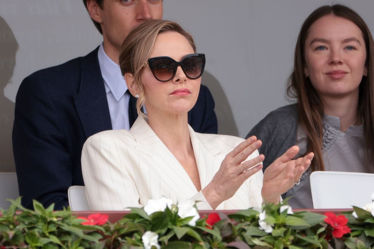 Charlene of Monaco turns heads at the Monte Carlo Masters in a tailored white suit, as Sinner claims victory and returns to world No. 1.