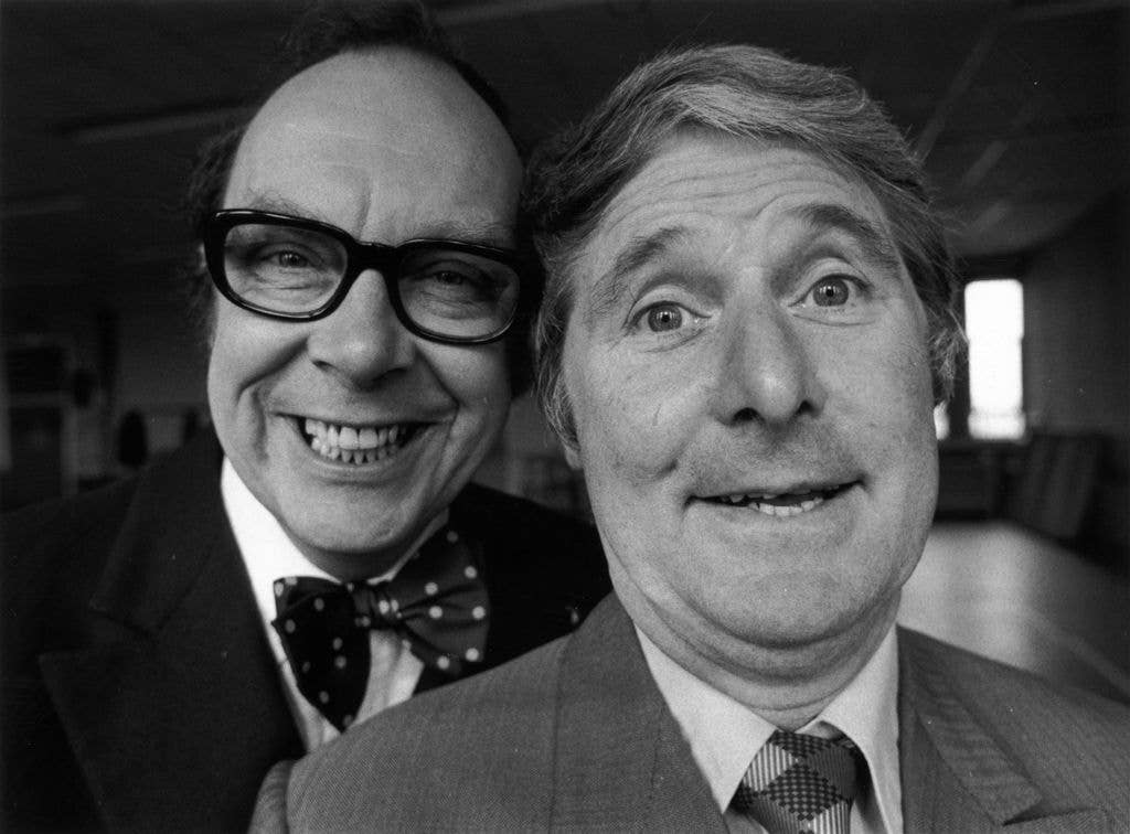 Black-and-white photo of Eric Morecambe and Ernie Wise smiling