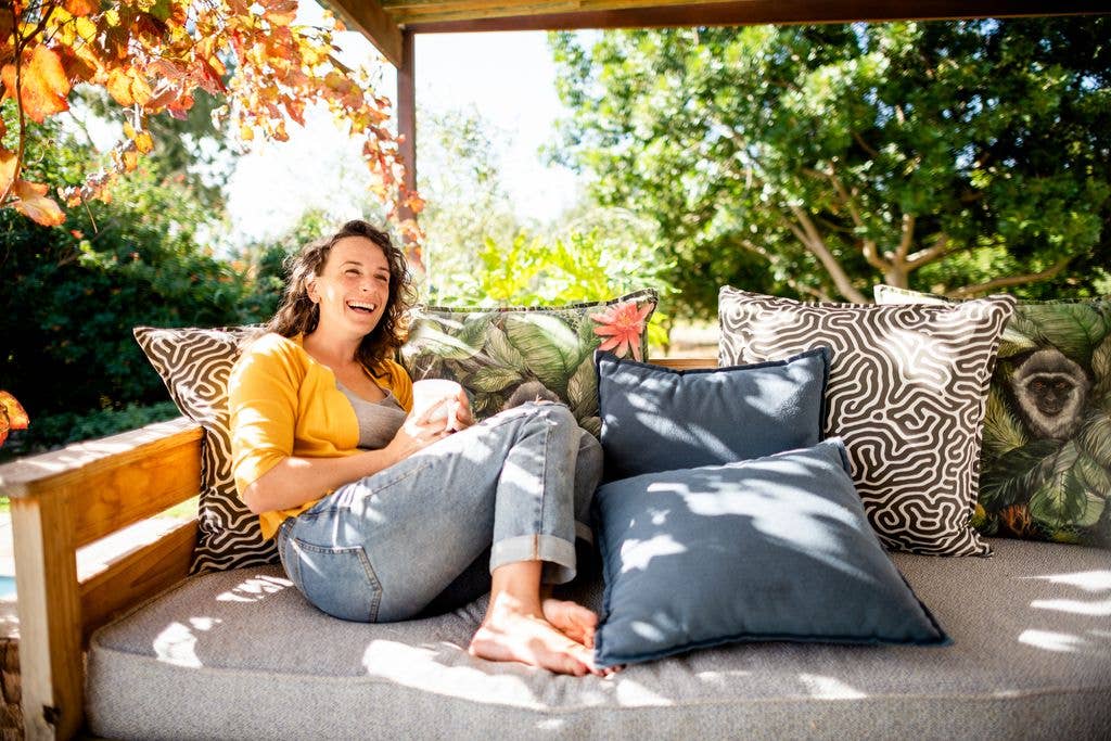 woman in garden laughing