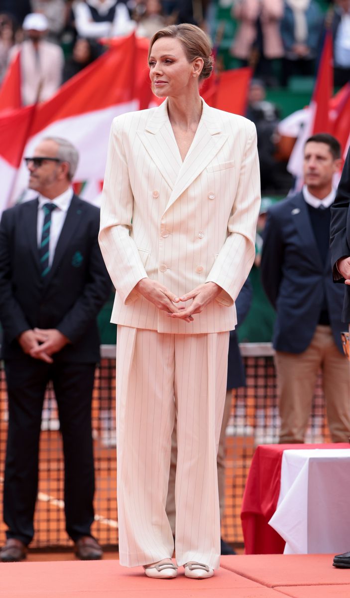Charlene of Monaco turns heads at the Monte Carlo Masters in a tailored white suit, as Sinner claims victory and returns to world No. 1.