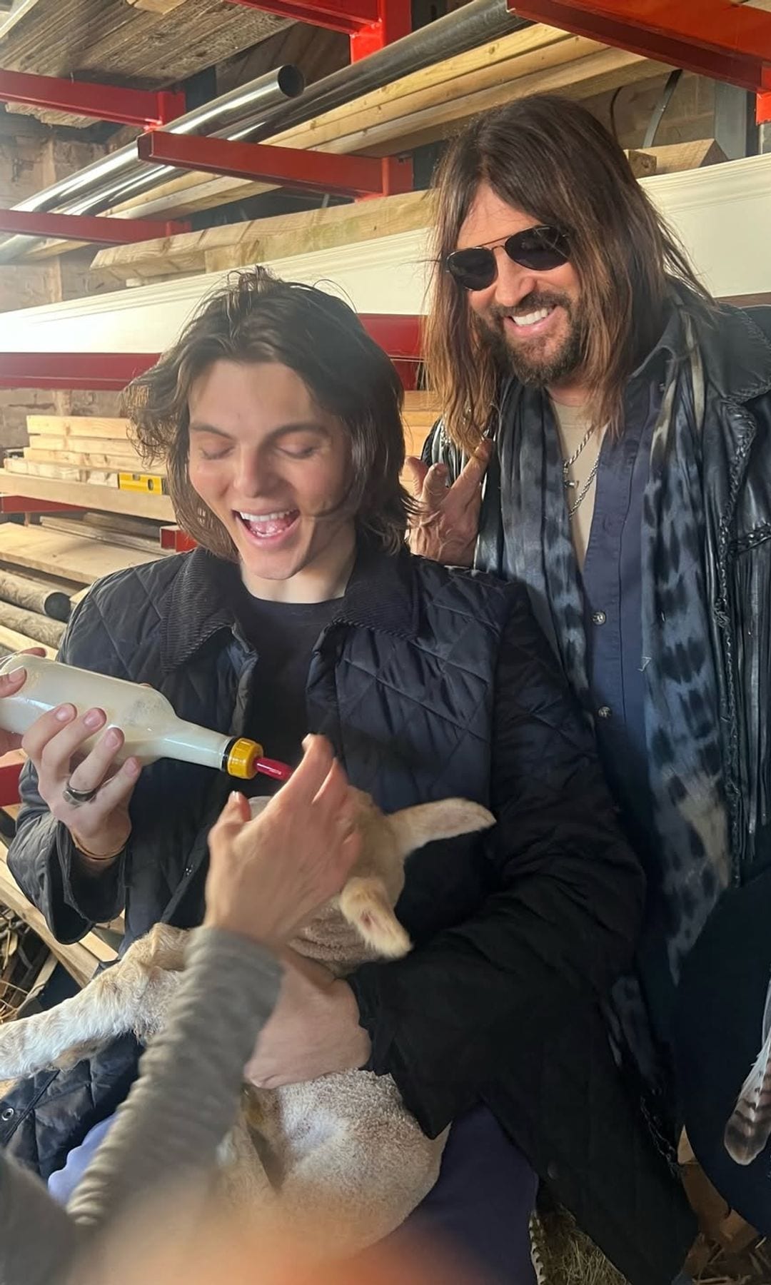 Damian and Billy Ray were seen trying to feed a baby goat