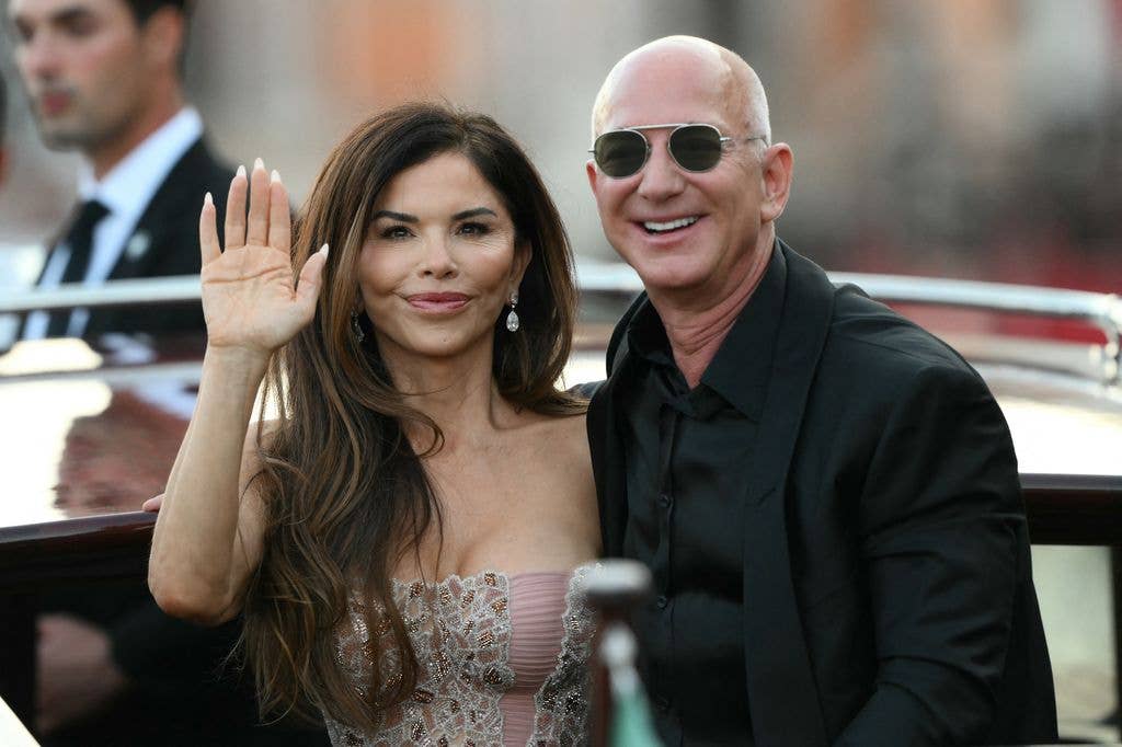Amazon's founder Jeff Bezos and Lauren Sanchez Bezos leave the Aman Hotel on the third day of their wedding festivities