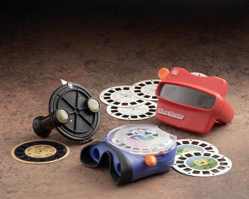Three generations of a View-Master "3-D Viewer" are seen displayed in this photograph from Fisher-Price