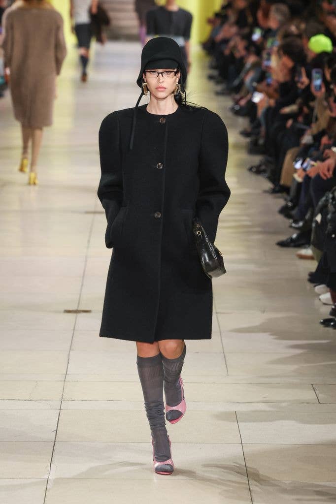 Amelia Gray walks the runway during the Miu Miu Womenswear Fall/Winter 2025-2026 show