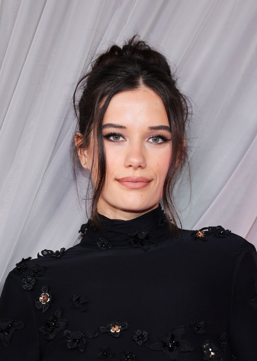 John Travolta’s daughter Ella channels mom Kelly Preston in elegant high-neck gown