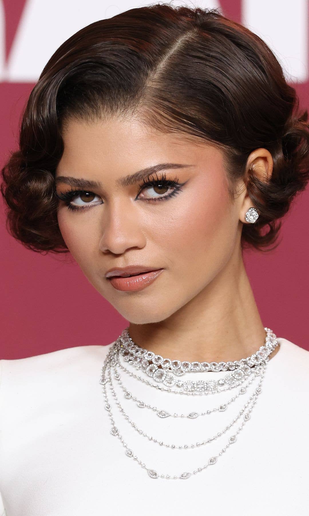 Zendaya wears a pure white dress to the "The Drama" premiere