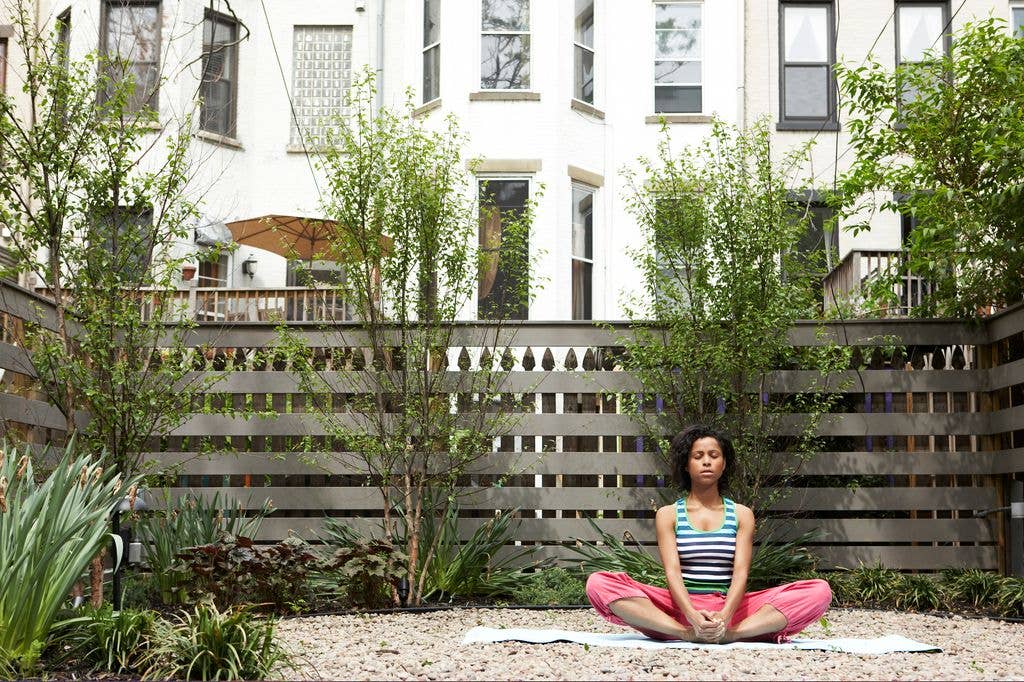 woman in garden sat down 