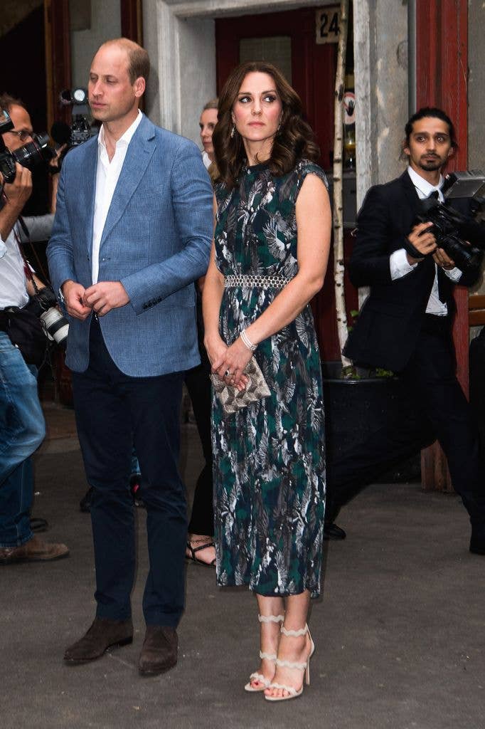 Kate in printed midi dress beside William