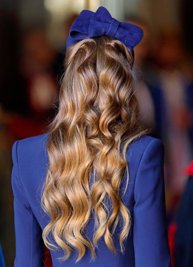 Kate from behind with her hair in cascading mermaid waves 