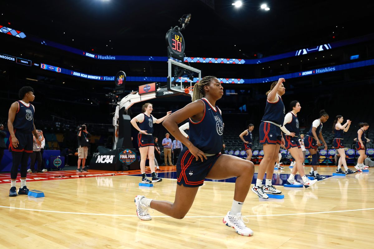 Gandy Malou-Mamel #42 of the Connecticut Huskies stretches during an open practice ahead of the 2026 NCAA Women's Basketball Tournament Final Four.