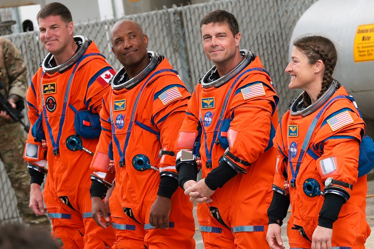  Mission specialist Jeremy Hansen of CSA (Canadian Space Agency), pilot Victor Glover, commander Reid Wiseman and mission specialist Christina Koch walk out of the Neil A. Armstrong Operations and Checkout Building ahead of the launch of the Artemis II.
