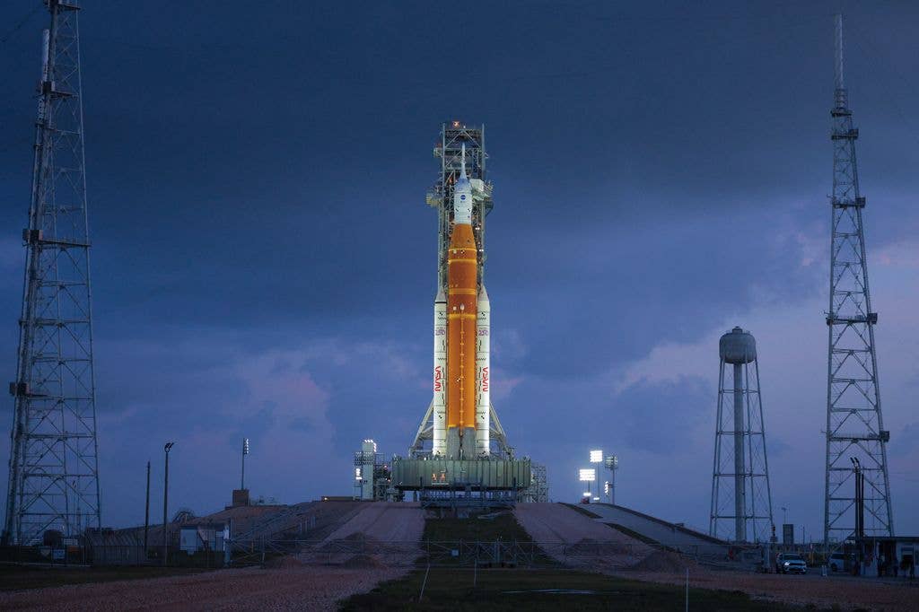 NASA's 322-foot-tall Artemis II Space Launch System rocket and Orion spacecraft stand on Launch Complex 39B at Kennedy Space Center on March 31, 2026 in Cape Canaveral, Florida. The 10-day mission will take NASA astronauts Commander Reid Wiseman, Pilot Victor Glover and Mission Specialist Christina Koch and CSA (Canadian Space Agency) Mission Specialist Jeremy Hansen around the moon and back. The astronauts are supposed to fly 230,000 miles out into space, the farthest any human has ever traveled from Earth.