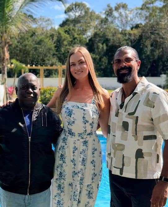 Sian Osborne and David Haye standing in front of a pool