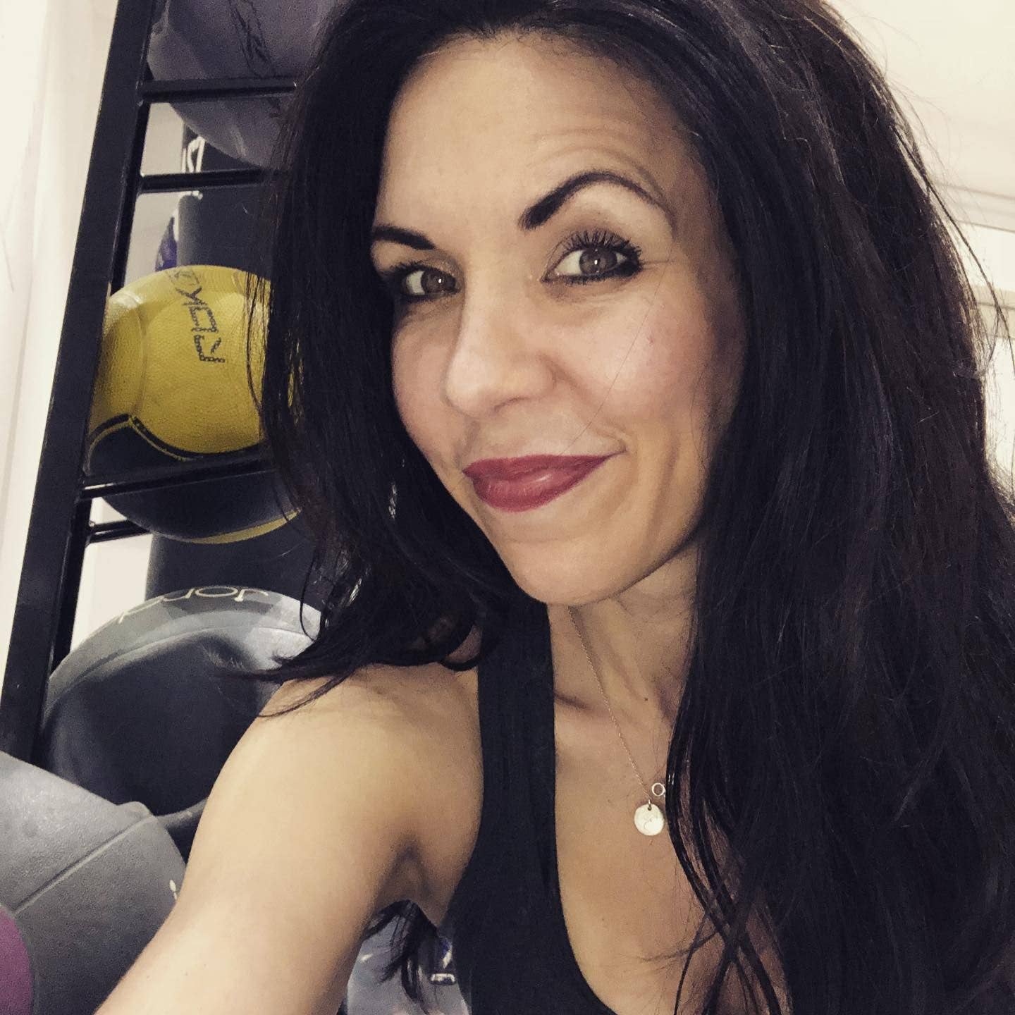 brunette woman taking selfie 