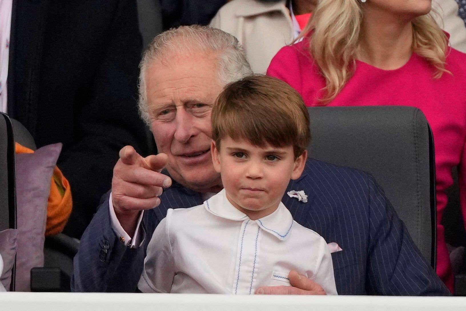 Prince Louis sat on his grandfather's lap during the Platinum Jubilee Pageant in 2022 