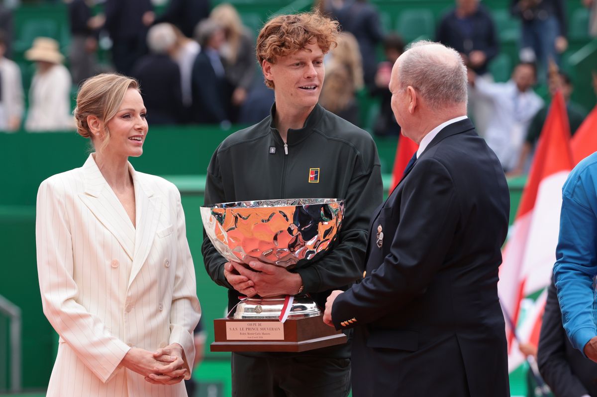 Charlene of Monaco turns heads at the Monte Carlo Masters in a tailored white suit, as Sinner claims victory and returns to world No. 1.