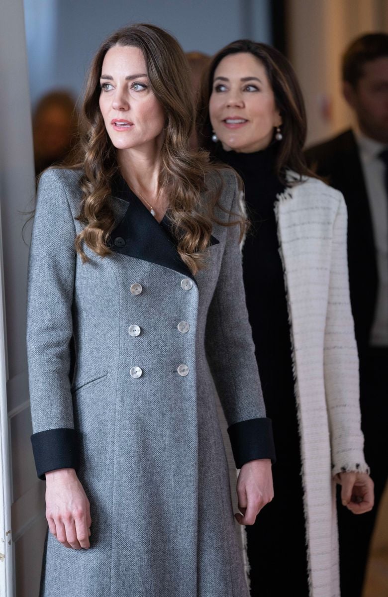 One of the clearest examples was the grey coat with black lapels she wore in Denmark in 2022, inspired by 18th-century naval frock coats.