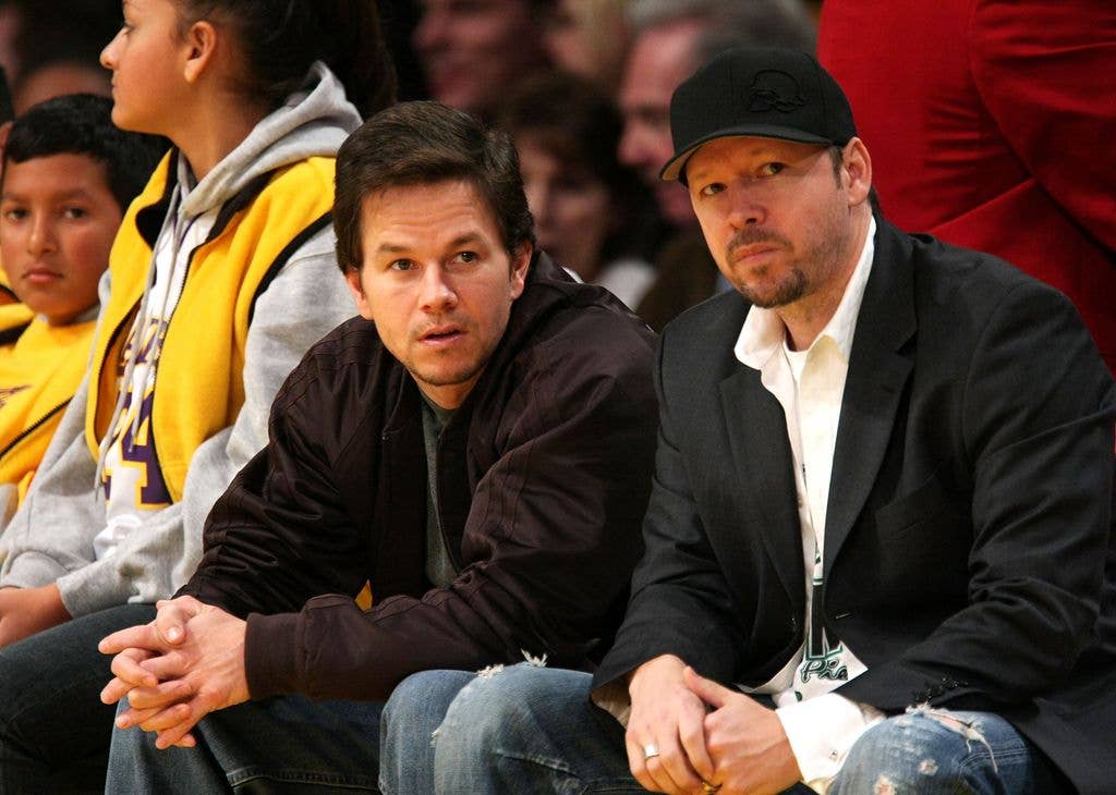 Mark Wahlberg (L) and Donnie Wahlberg (R) attend the Los Angeles Lakers vs Boston Celtics game at the Staples Center on December 30, 2007 in Los Angeles, California