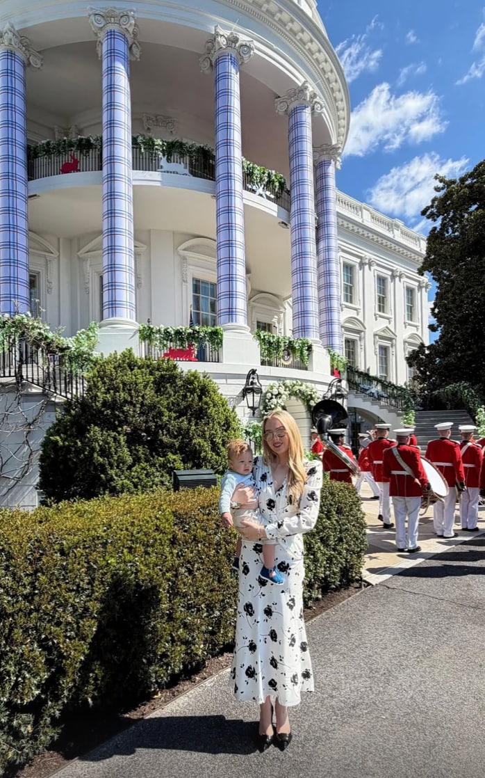 The outfit struck the perfect balance between polished and playful, ideal for a toddler’s first big public outing. His mother, Tiffany, embraced elegant femininity in a white midi dress adorned with black floral prints.