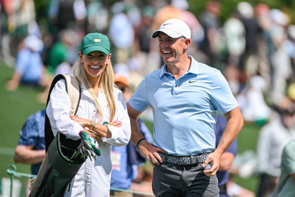 AUGUSTA, GEORGIA - APRIL 09: Rory McIlroy of Northern Ireland smiles with his wife Erica Stoll during the Par Three Contest prior to the Masters Tournament at Augusta National Golf Club on April 9, 2025 in Augusta, Georgia. (Photo by Ben Jared/PGA TOUR via Getty Images)