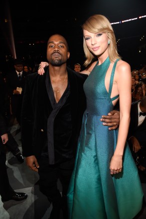 LOS ANGELES, CA - FEBRUARY 08:  Kanye West and Taylor Swift attend The 57th Annual GRAMMY Awards at STAPLES Center on February 8, 2015 in Los Angeles, California.  (Photo by Kevin Mazur/WireImage)