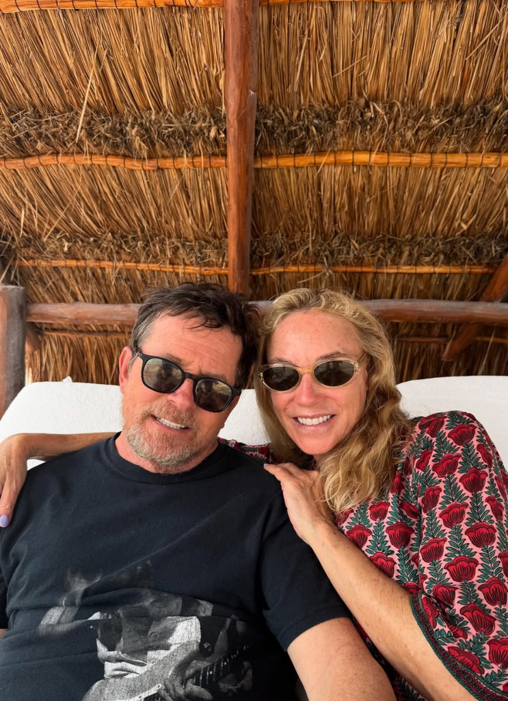 Photo shared by Tracy Pollan of her and husband Michael J. Fox at the beach in honor of his 65th birthday, June 2025
