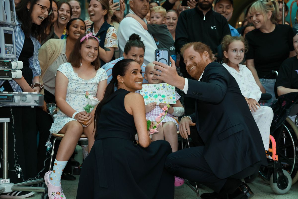 The pair took some adorable photos with young girls as they visited The Royal Children's Hospital in Melbourne