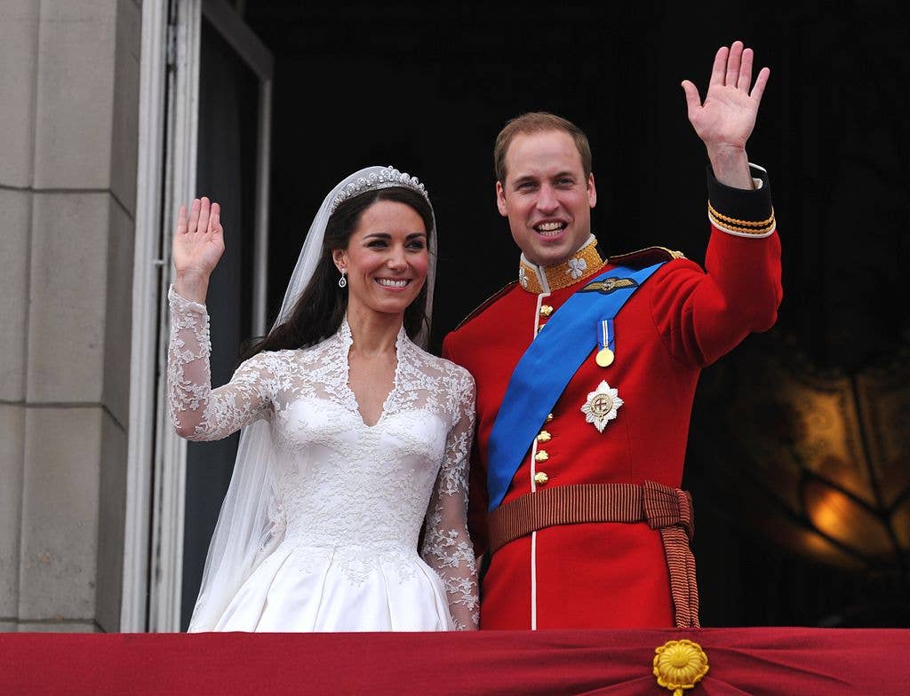 Newlyweds William and Kate wave on the balcony at Buckingham Palace 