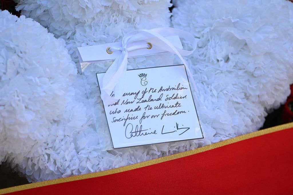 The inscription written on a wreath by Britain's Catherine, Princess of Wales, is pictured following a service to commemorate ANZAC day at the Cenotaph war memorial in central London on April 25, 2026