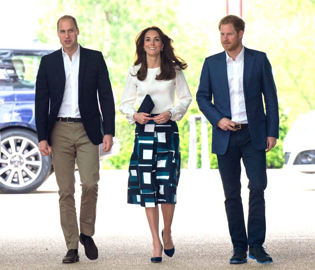 Prince William, Catherine and Prince Harry walking in a line