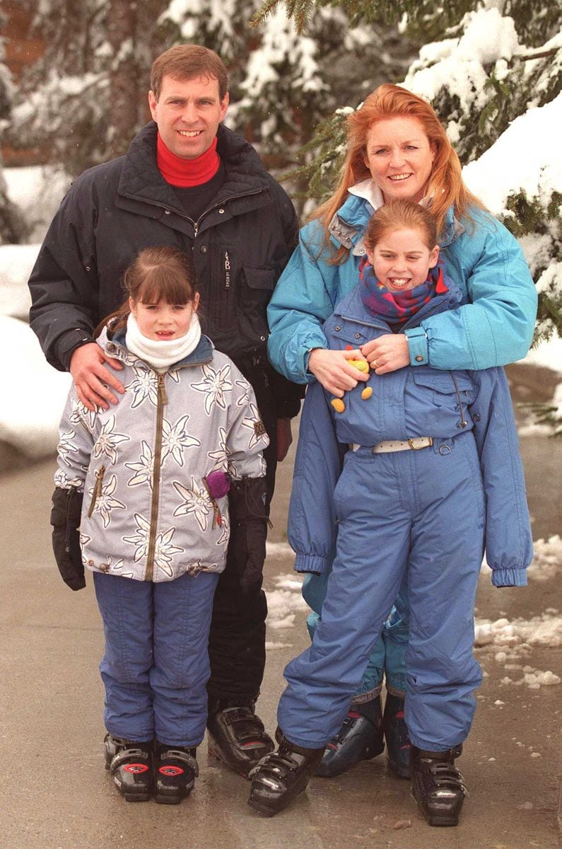 The Duke and Duchess of York pose for photographers while on Vacation In Verbier Switzerland with children Princess Beatrice and Eugenie February 19, 1999. (photo by UK Press/Julian Parker)