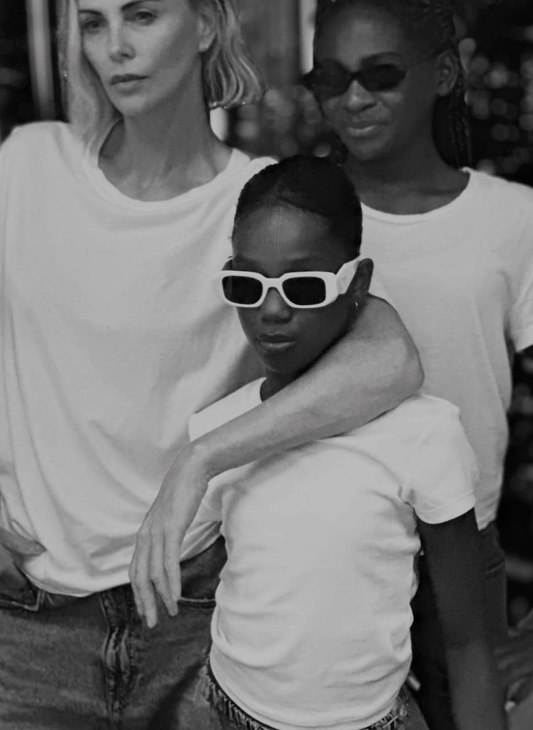 Photo shared by Charlize Theron on Instagram March 2025 featuring her daughters Jackson and August as they attended a Dua Lipa concert in Australia