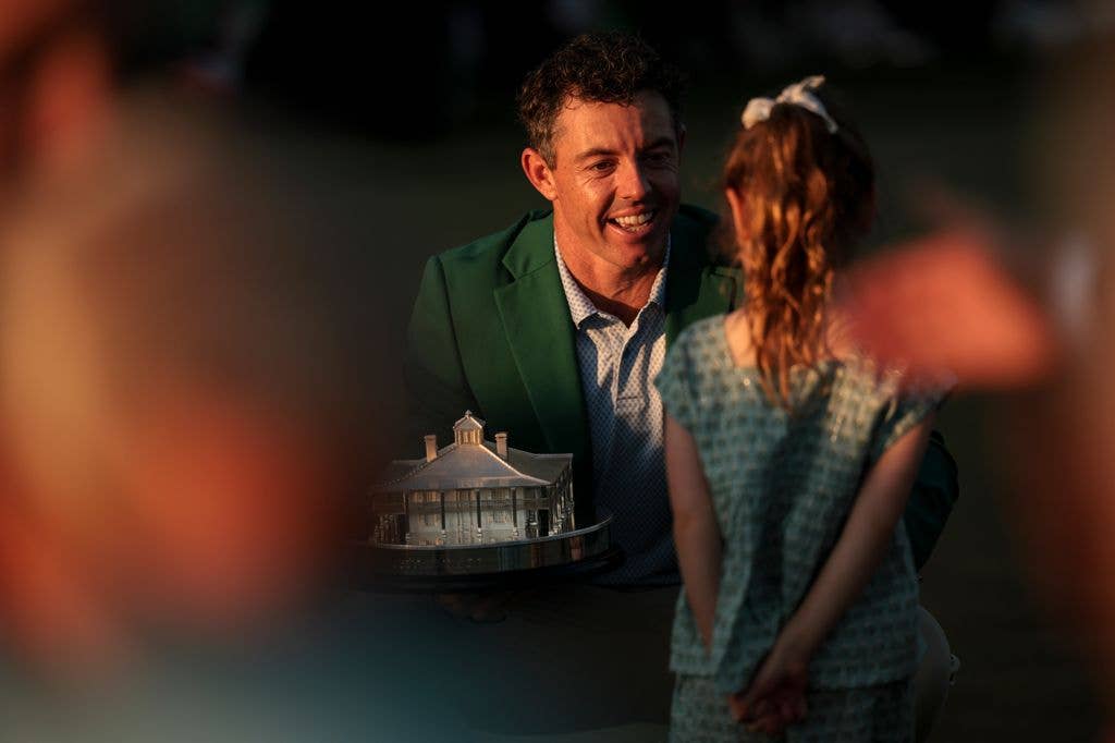 Rory crouches down to embrace Poppy as the crowd looked on