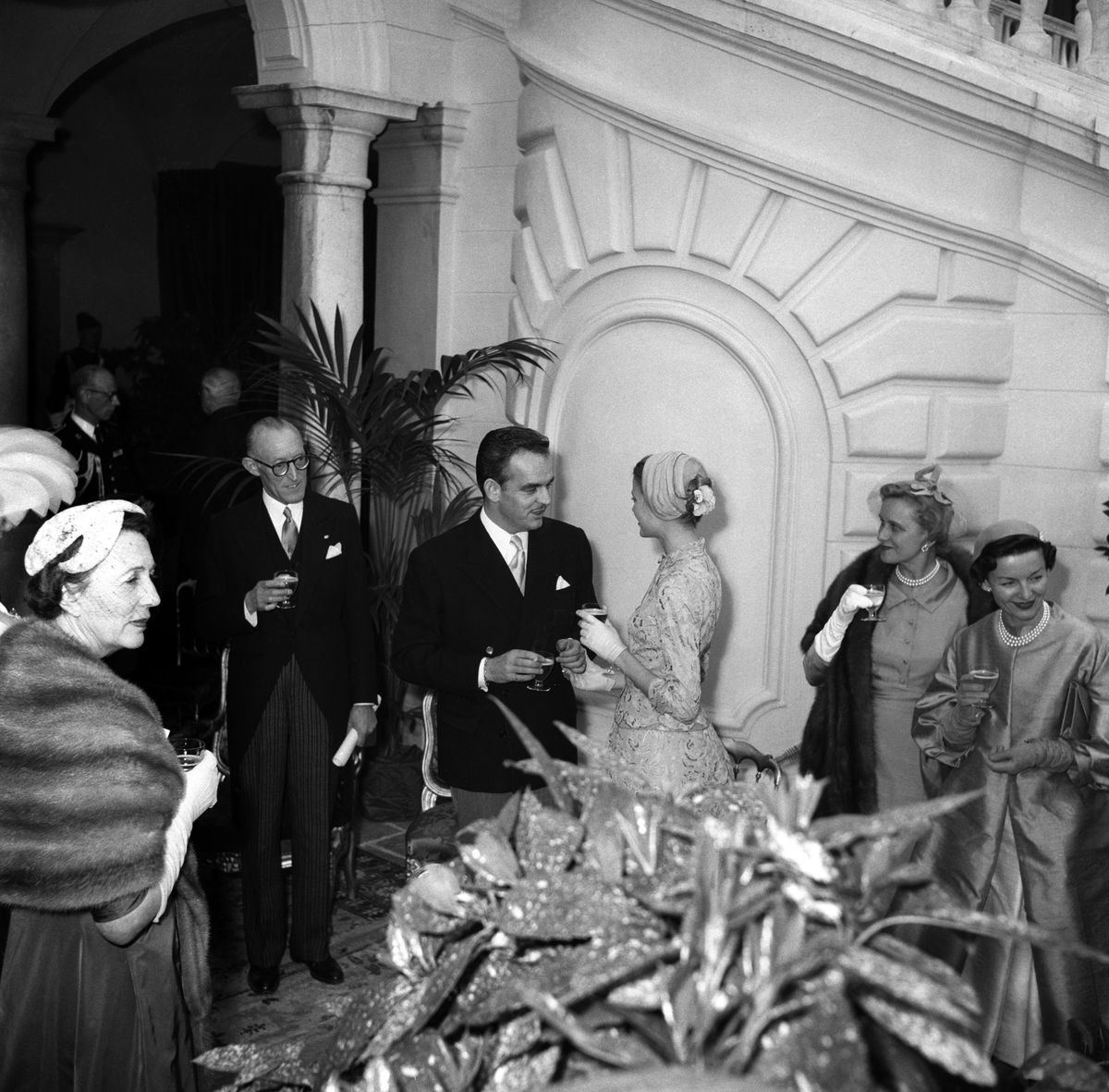 Prince Rainier of Monaco and Grace Kelly attend a reception at the Prince’s Palace following their civil wedding. Also pictured are Princess Antoinette, Rainier’s sister and Princess Charlotte, his mother, alongside Grace Kelly’s mother.