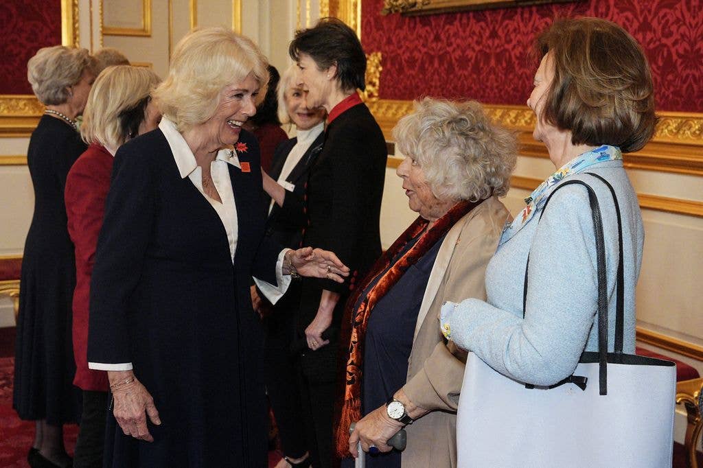 The Queen was spotted laughing at Miriam's message