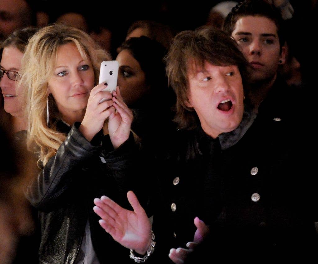 Heather Locklear and Richie Sambora watch their daughter Ava Sambora walk the runway at the White Trash Beautiful Spring 2011 Fashion Show held at Sunset Gower Studios on October 17, 2010 in Los Angeles, California