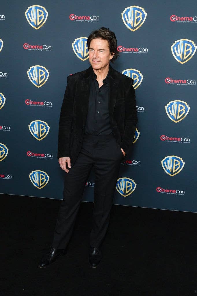 Tom Cruise in a black suit attended CinemaCon 2026