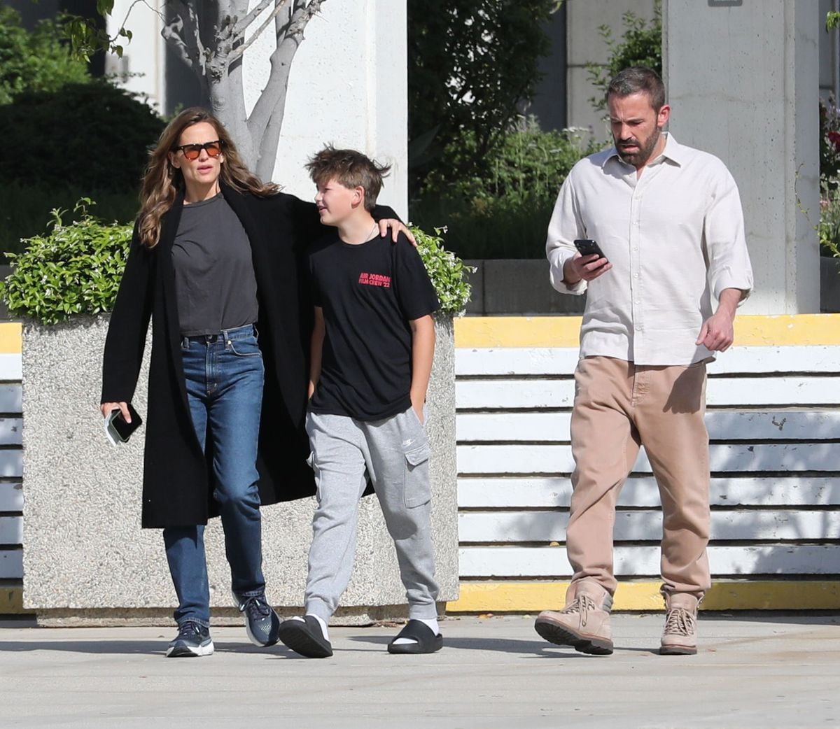 Ben Affleck and Jennifer Garner taking their son Samuel to the Federal Building in Los Angeles to handle passport errands on April 3, 2026.