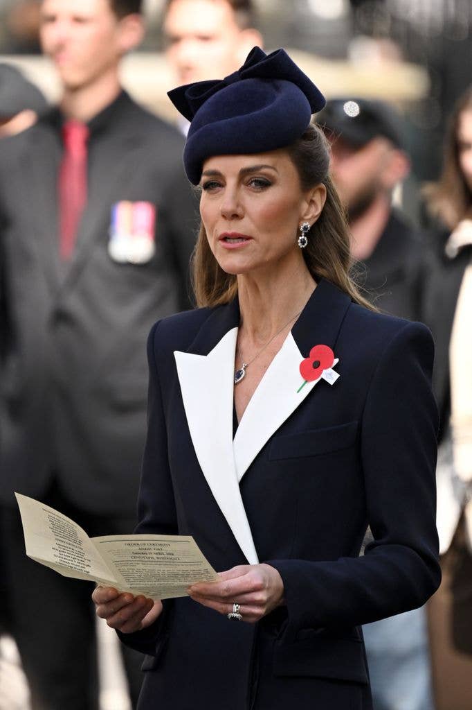 Princess Kate sings as she attends the wreath laying and parade service as part of the ANZAC Day commemorations at the Cenotaph