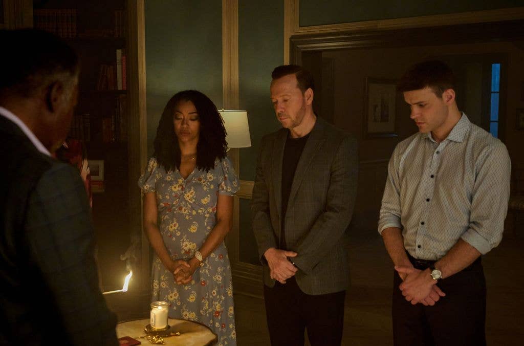 Ernie Hudson as Reverend Peters, Sonequa Martin-Green as Lena Silver, Donnie Wahlberg as Danny Reagan, and Mika Amonsen as Sean Reagan  on Boston Blue