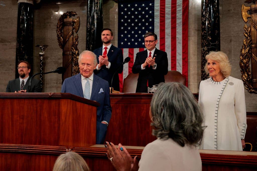 Queen Camilla looking on in a white outfit as King Charles addressed a joint meeting of Congress