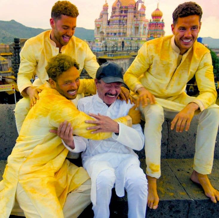 Ryan Thomas, Adam Thomas and Scott Thomas with their father in India