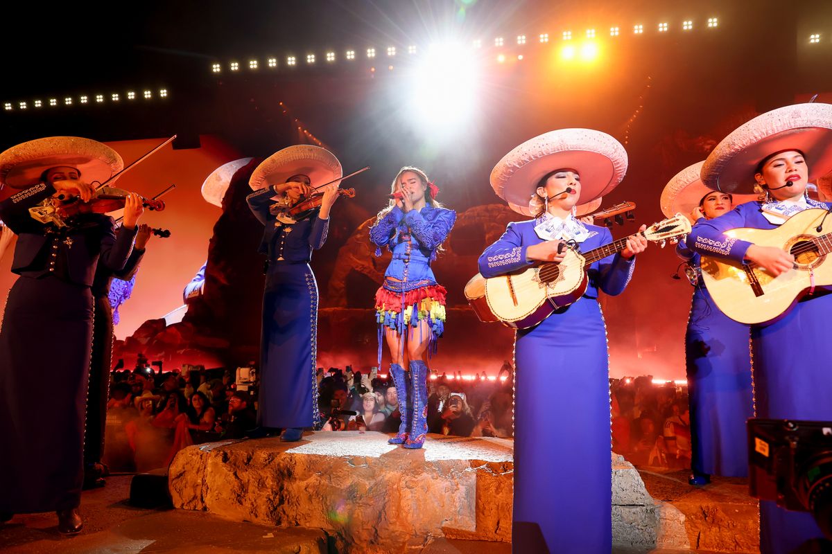 Karol G performs at the Coachella Stage during the 2026 Coachella Valley Music and Arts Festival alongside a Mariachi band.