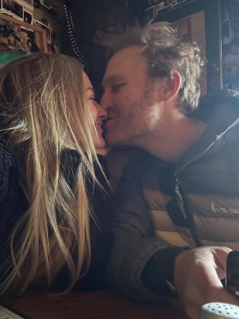 Wyatt Russell and Meredith Hagner kissing 