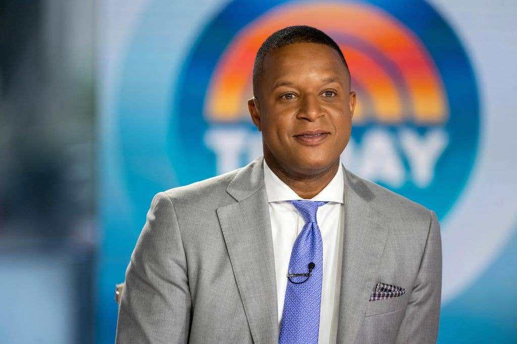 Craig Melvin in gray suit