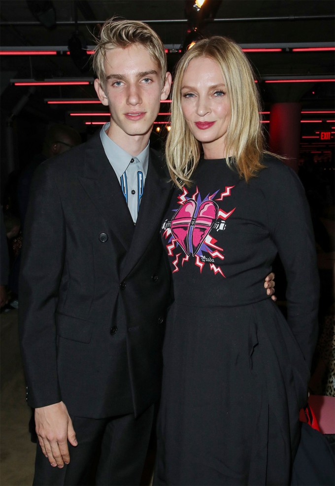 Uma Thurman with her son Levon at the Prada Resort 2020 show