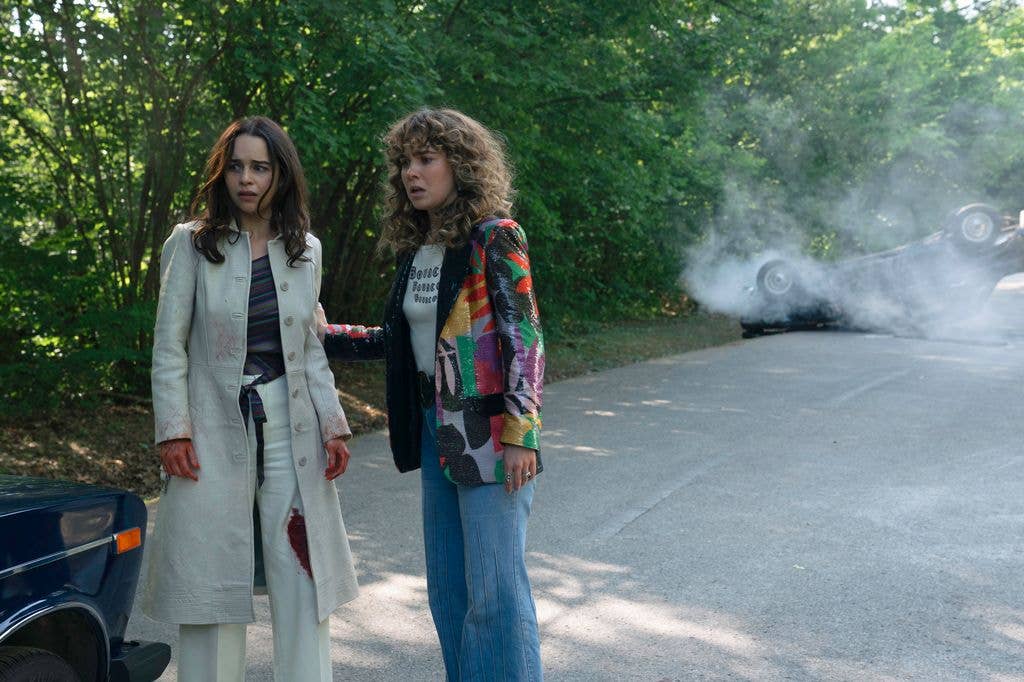 Emilia Clarke as Bea, Haley Lu Richardson as Twila in Ponies