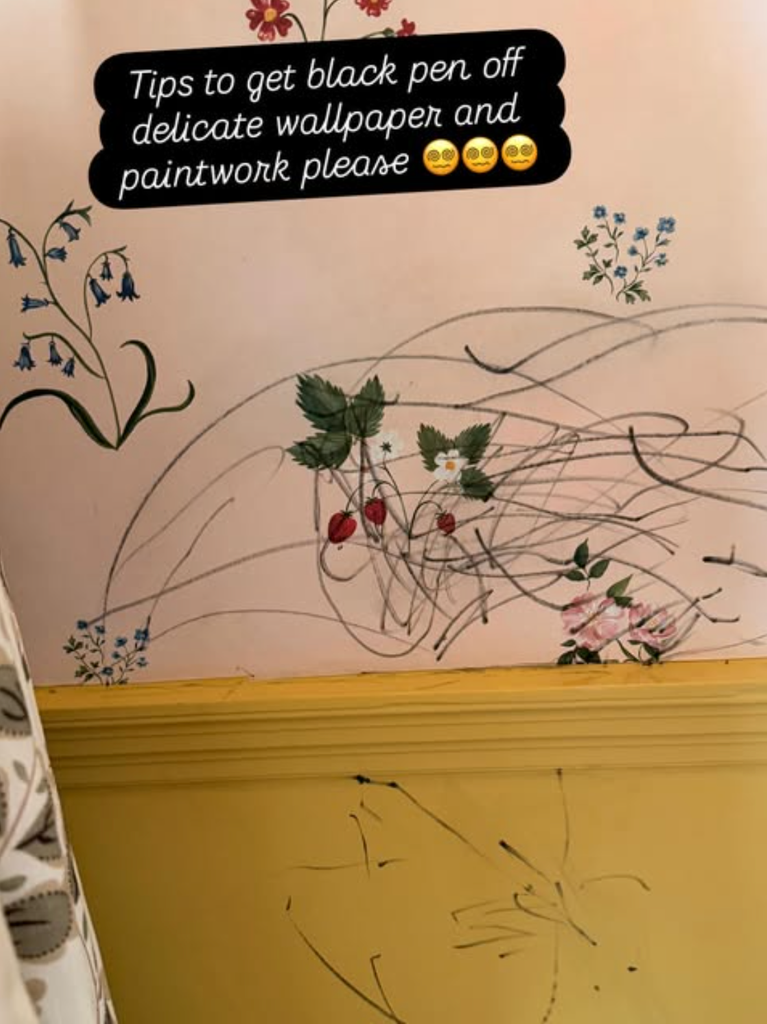 A photo of Carrie Johnson's wall covered in pen