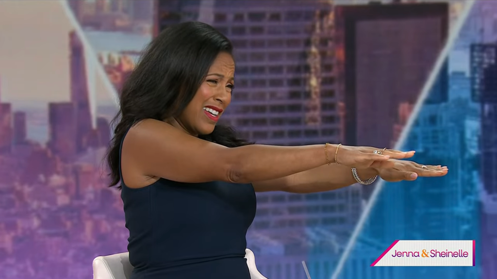 Sheinelle Jones extends her arms to highlight her frozen shoulder on TODAY with Jenna & Sheinelle, airing on May 19, 2026