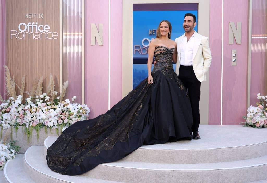 Jennifer Lopez Brett Goldstein attend the world premiere of Netflix's "Office Romance"